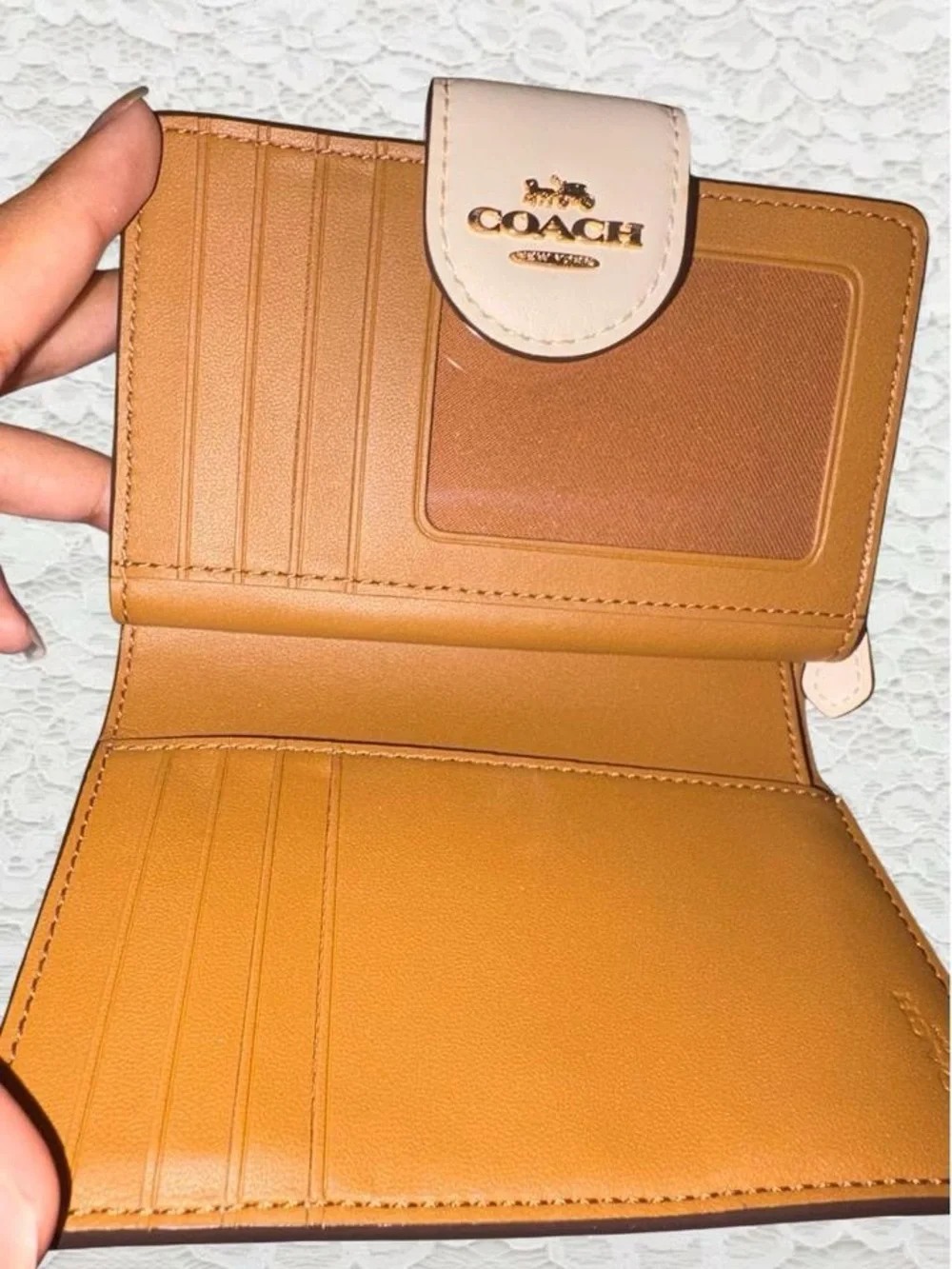 Tan and cream Coach Rowan daisy wallet